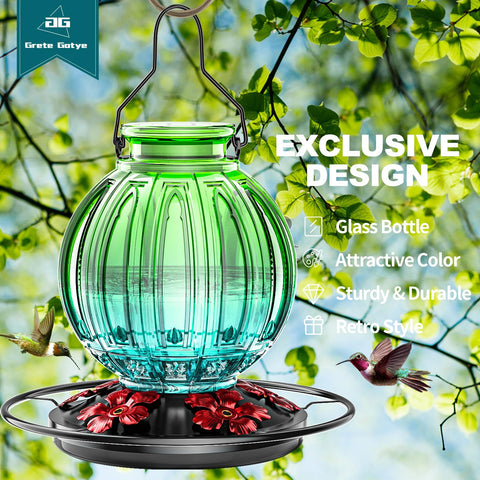 Grete Gotye hummingbird feeder green side view, vivid color in garden
