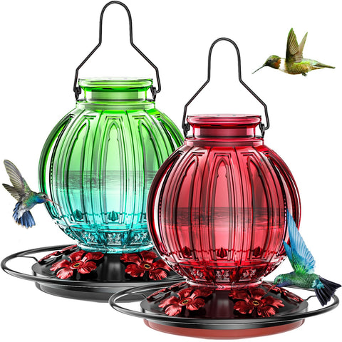 Grete Gotye glass hummingbird feeder in outdoor color scheme for year-round use