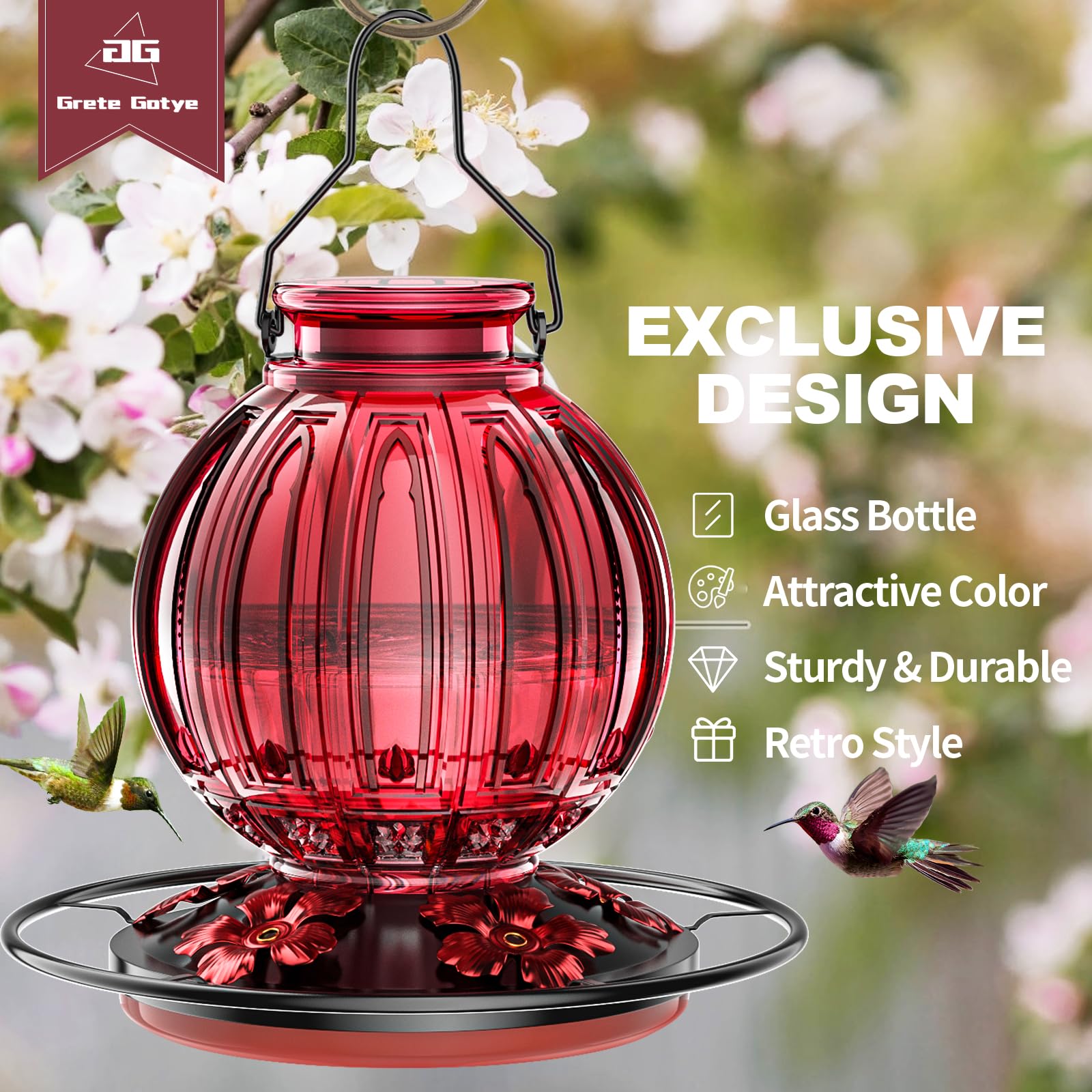 Grete Gotye glass feeder with red cap, ideal for vibrant garden birds.