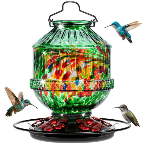 Grete Gotye hand blown glass hummingbird feeder with five flower ports attracts birds outdoors