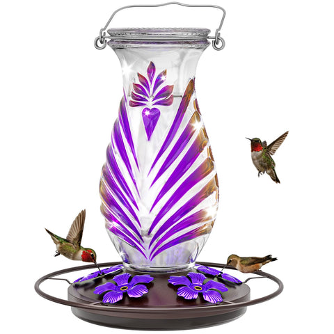 Grete Gotye lavender glass hummingbird feeder showing the nectar reservoir and durable design.