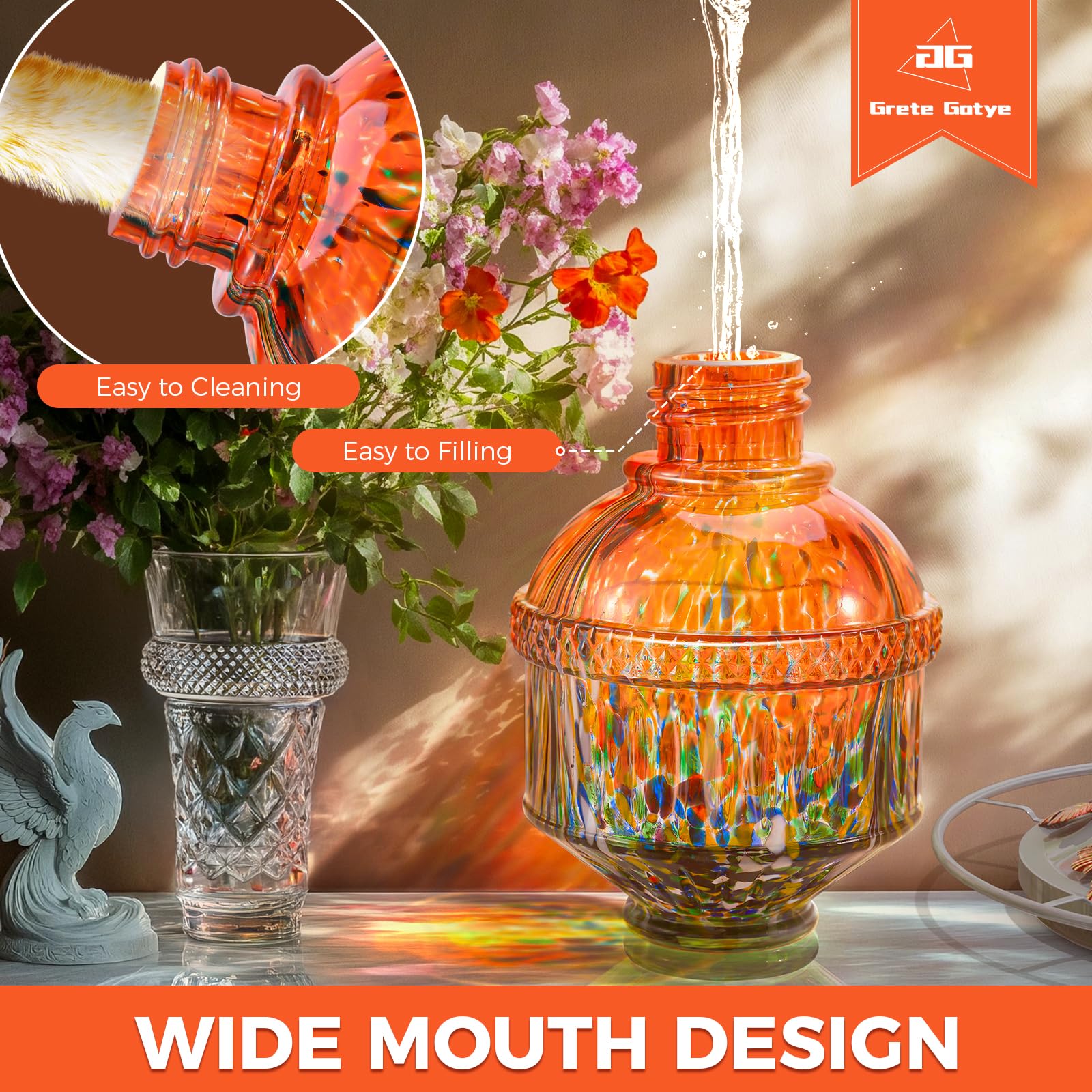 Grete Gotye orange outdoor hummingbird feeder enhances garden decor