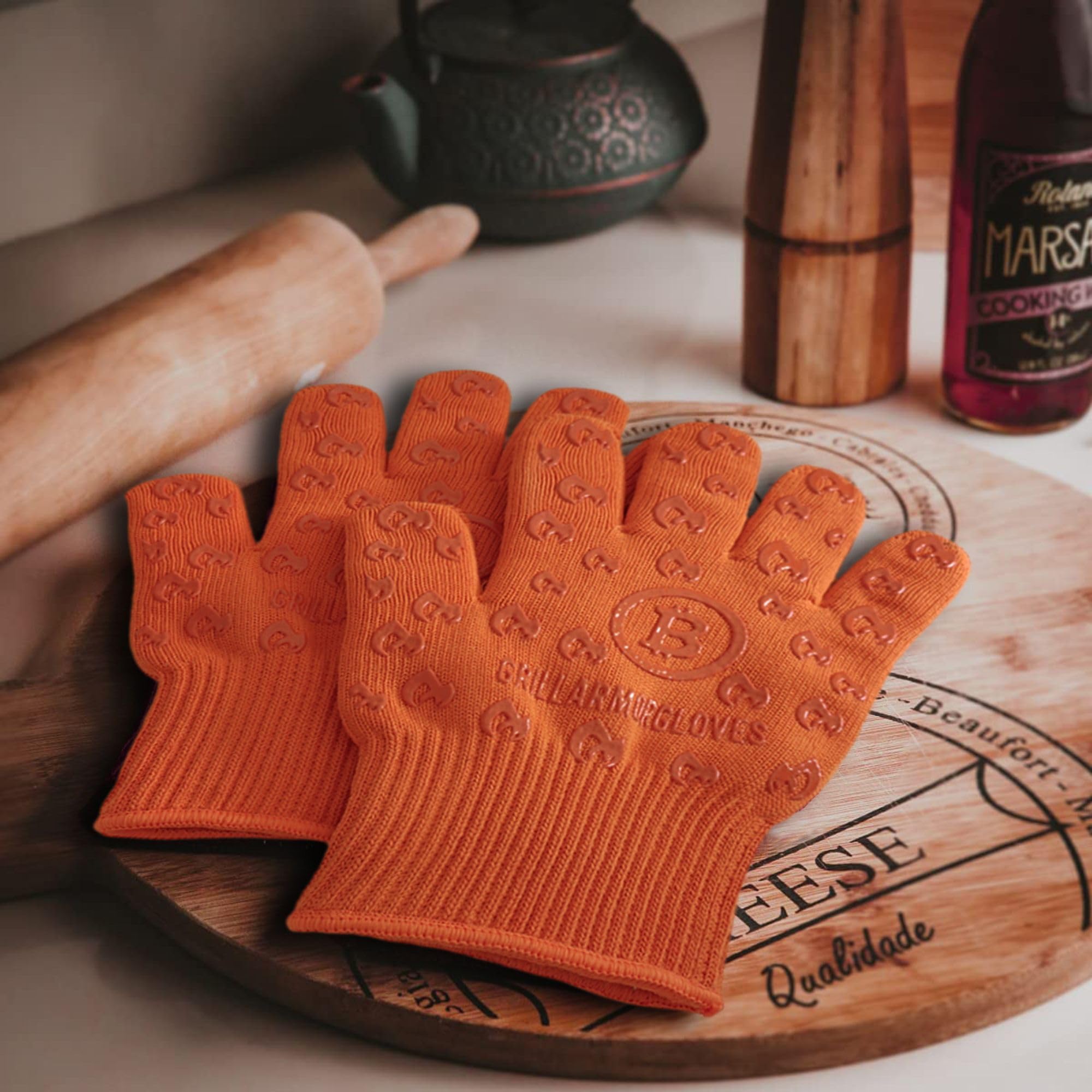 Grill Armor Gloves assist in carving meat with precision.
