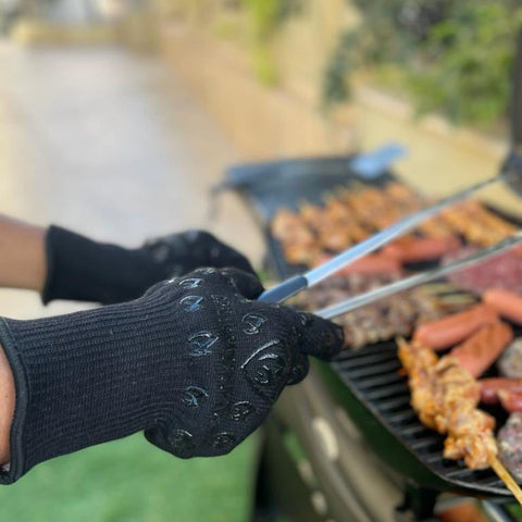 Grill Armor Gloves with extra-long cuffs shield forearms during open-fire cooking.