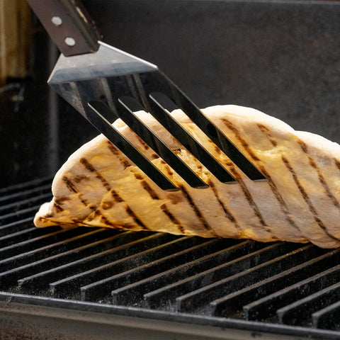 GrillGrate Grate Tool under-rail lift example at grill