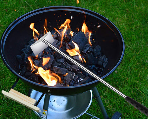 Grilliance detachable-handle ash rake demonstrating adjustable length for safety.