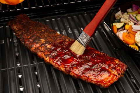 GrillPro basting brush shows an 18 inch reach for hard to reach areas.