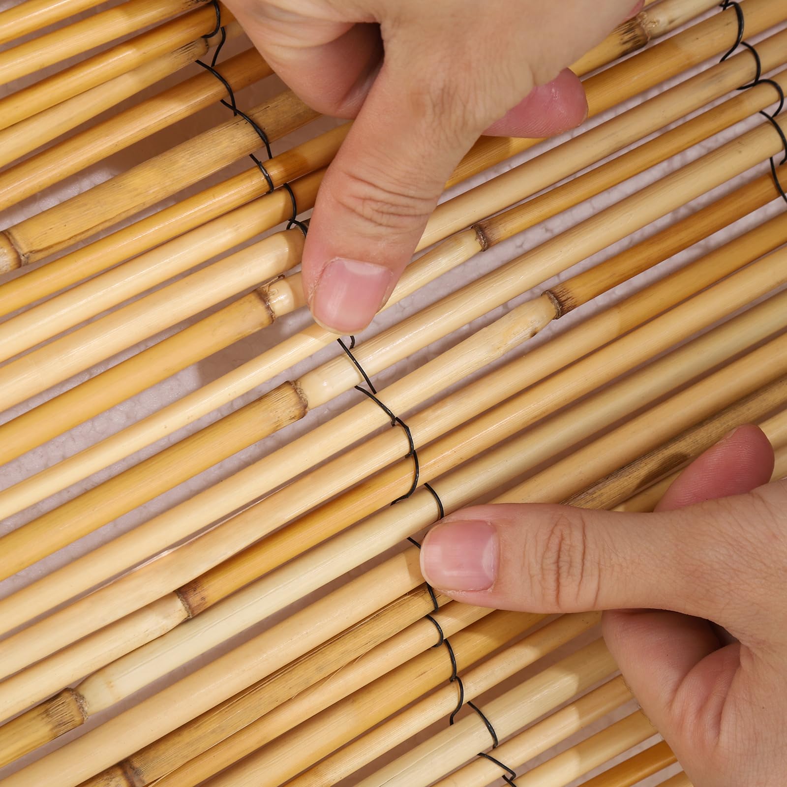 Groovboo pool-area reed fence offers natural coverage with style.