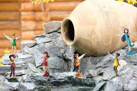 Grostmend Tinkerbell fairy figurine close-up highlights hand painted detail and color.