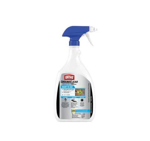 Groundclear Ortho weed killer applied on patio weeds near a driveway.