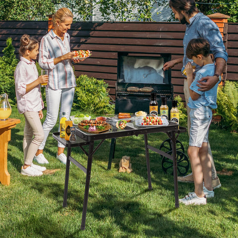 Grovind portable table showing folding legs for easy transport.