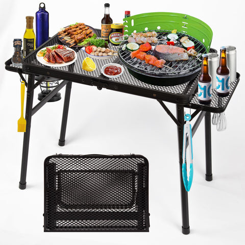 Grovind picnic table with wing panels for extra prep space outdoors.
