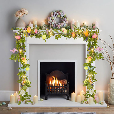 Gudegou 6ft garland on mantel adds seasonal warmth.