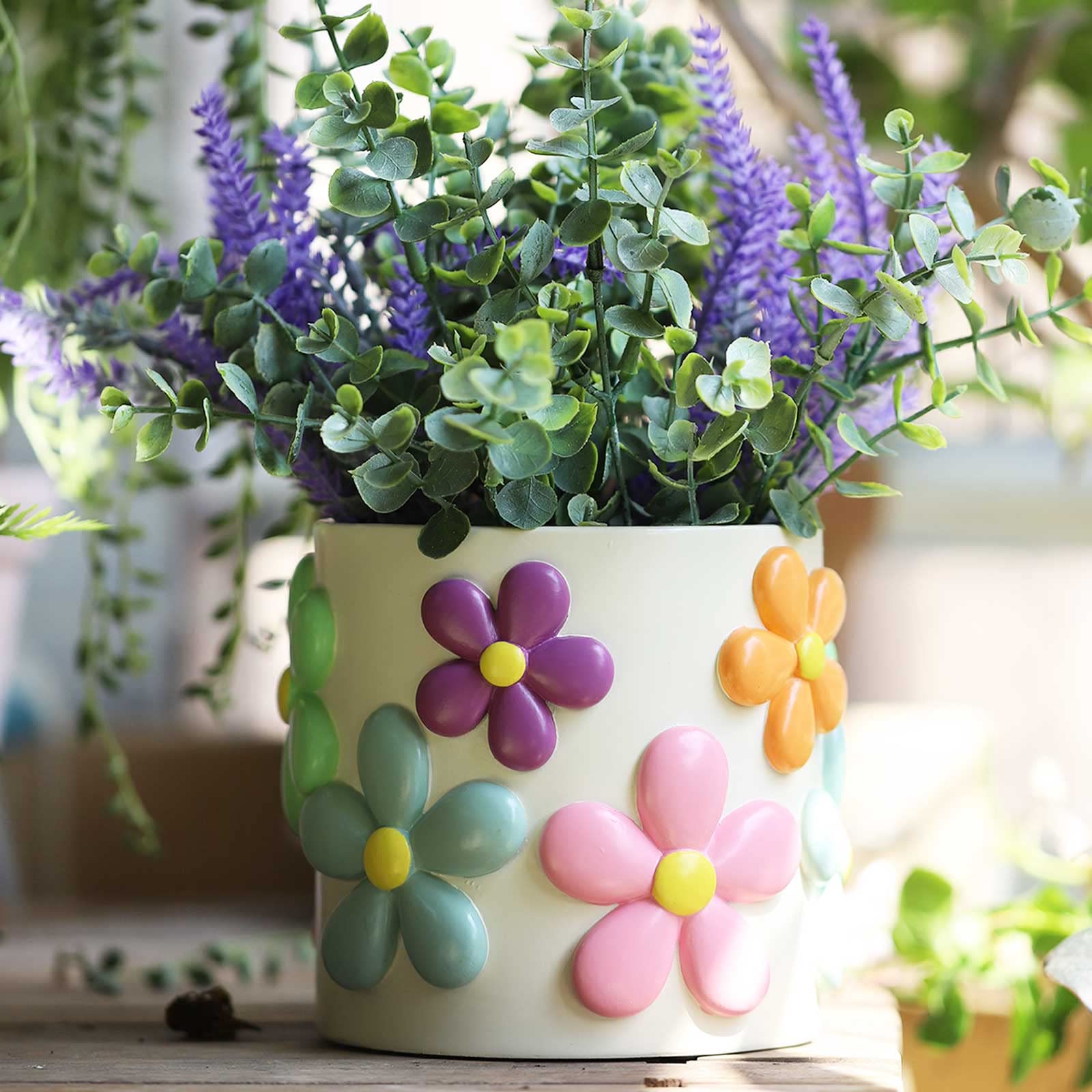 GUGUGO colorful flowers planter with 360-degree painting enhances indoor plant displays.