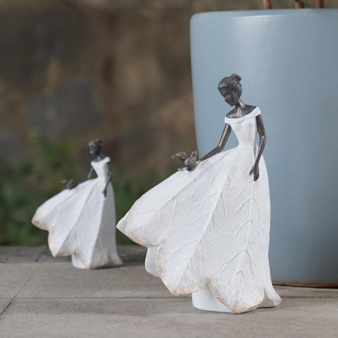 Guichifun angel figure on shelf enhances retirement gift appeal and calm decor.