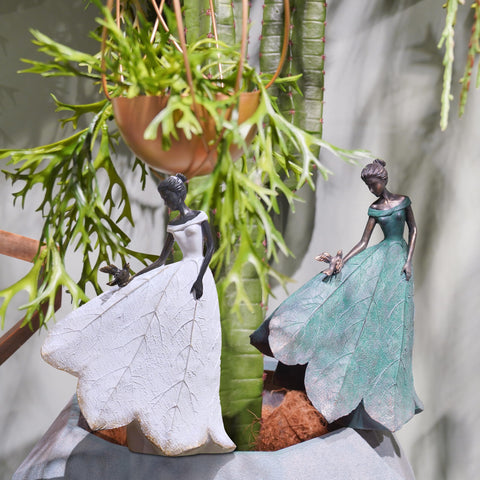 Guichifun angel girl on a shelf offers elegant indoor focal point