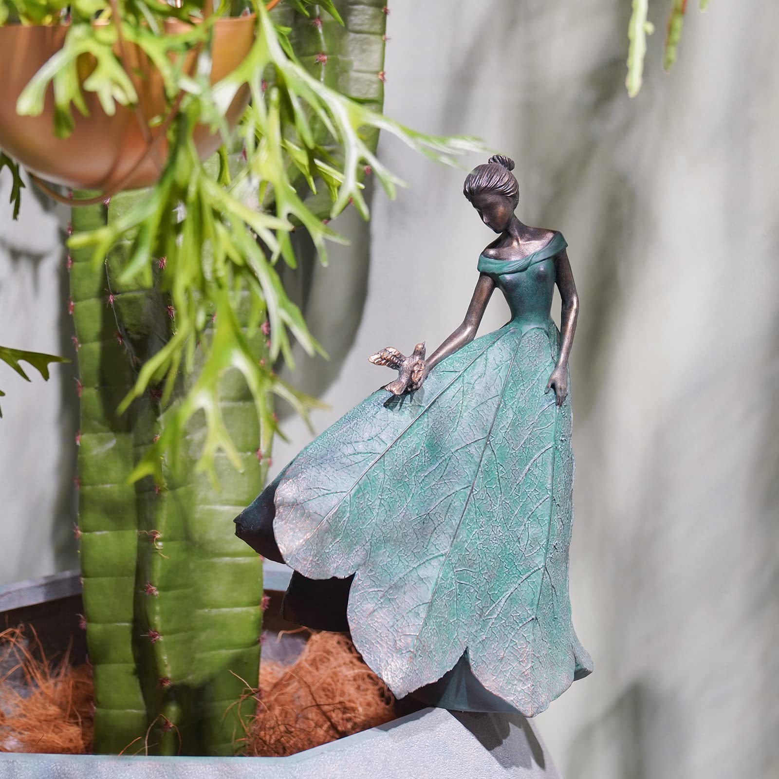 Guichifun bronze-patina leaf angel statue stands gracefully