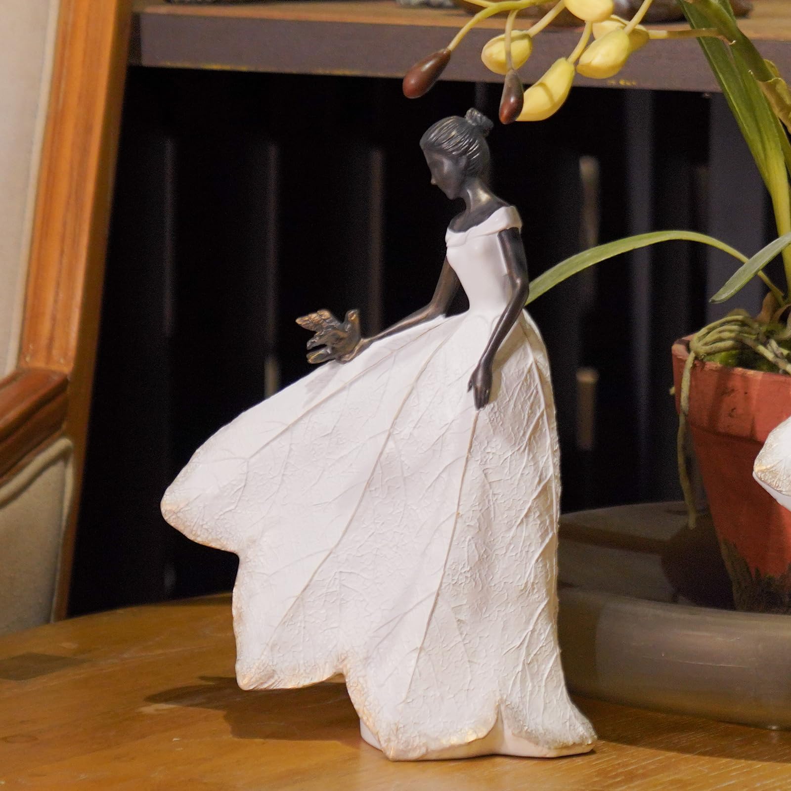 Guichifun fairy statue holding lily brings elegant indoor ambiance and everyday charm.