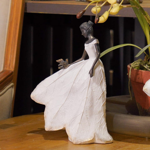 Guichifun fairy statue holding lily brings elegant indoor ambiance and everyday charm.
