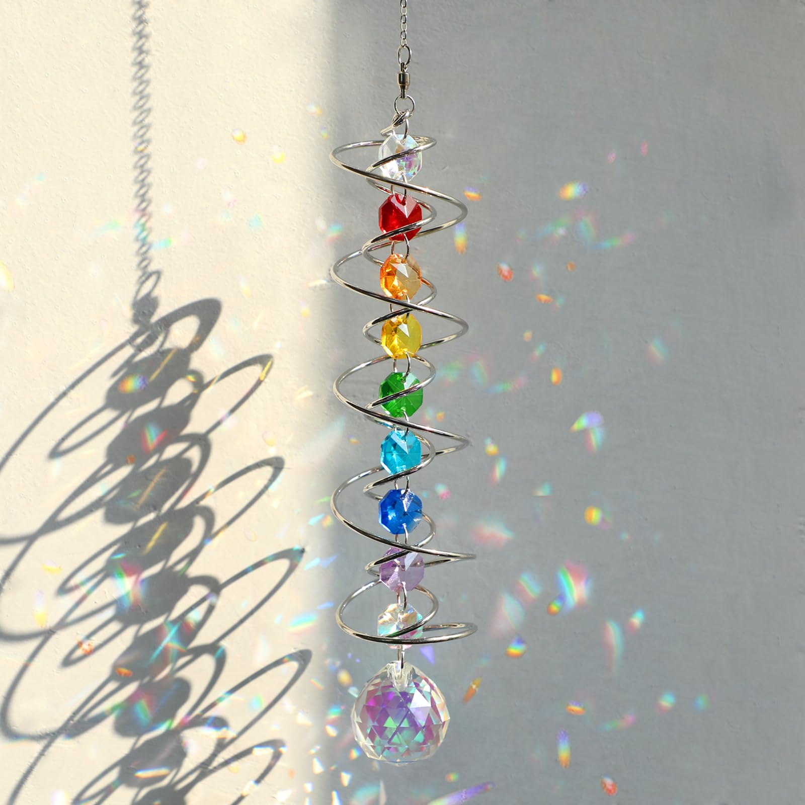GWAHSA suncatcher wind spinner spiral tail catches sunlight and creates rainbow reflections.