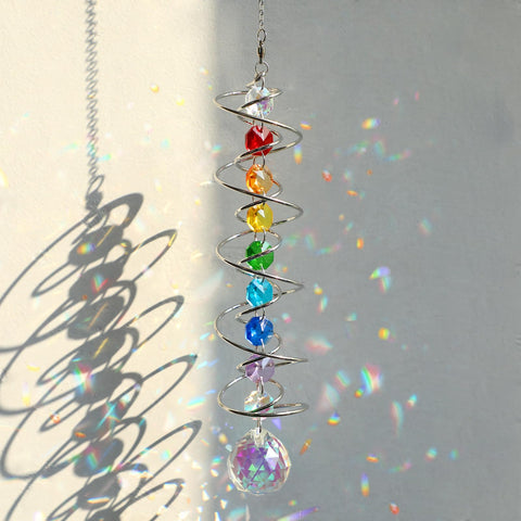 GWAHSA suncatcher wind spinner spiral tail catches sunlight and creates rainbow reflections.