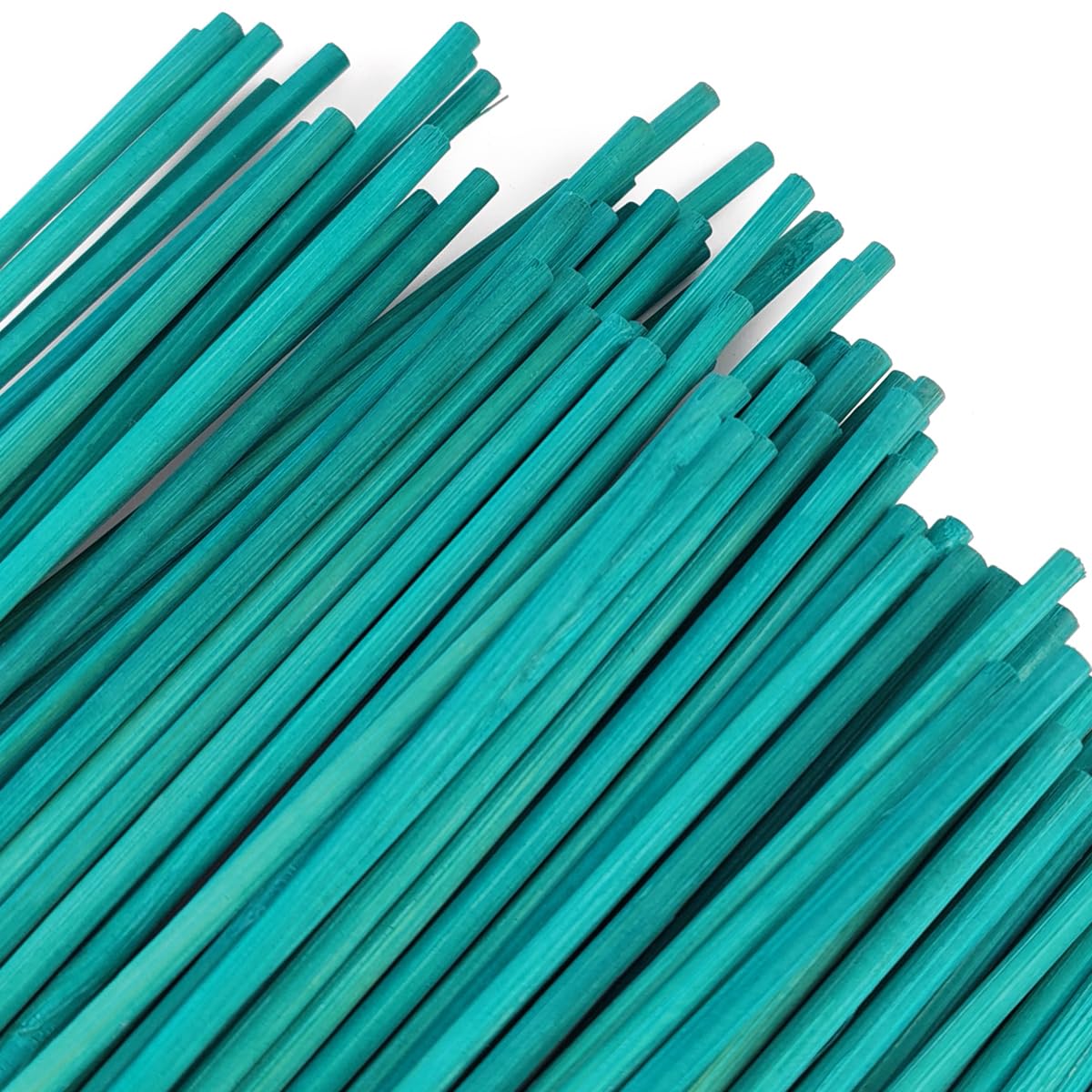 GXXMEI bamboo stakes in soil for garden beds and flower arrangements.