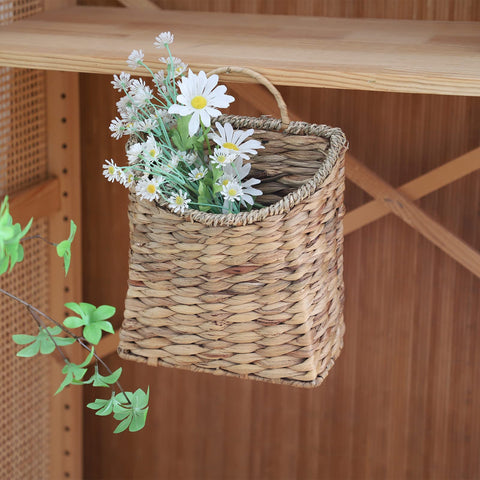 GYASVWU rustic wicker storage basket complements living room or balcony decor.