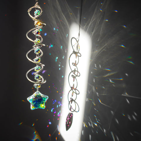 H&D Hyaline & Dora gazing ball sun catcher reflects sunlight into rainbow hues on windows.