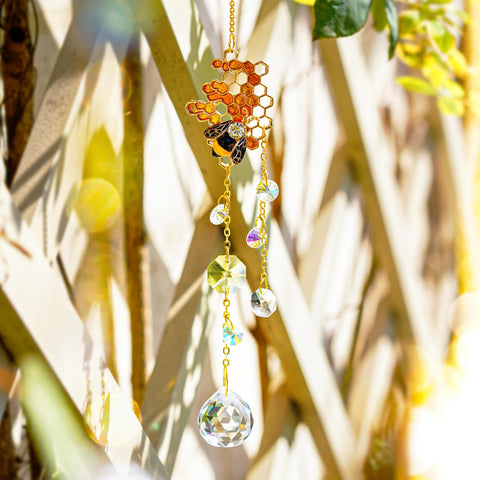 H&D HYALINE & DORA crystal bee suncatcher with metal bee accent catches daylight.