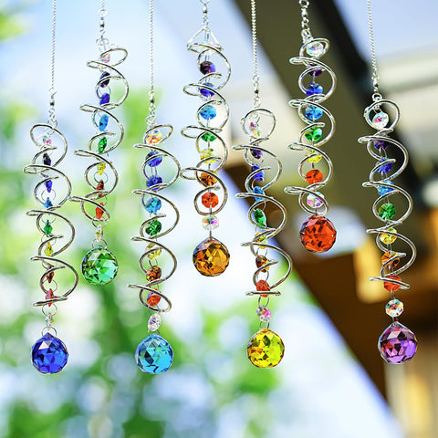 H and D Hyaline and Dora colorful wind spinners add dynamic outdoor decor.