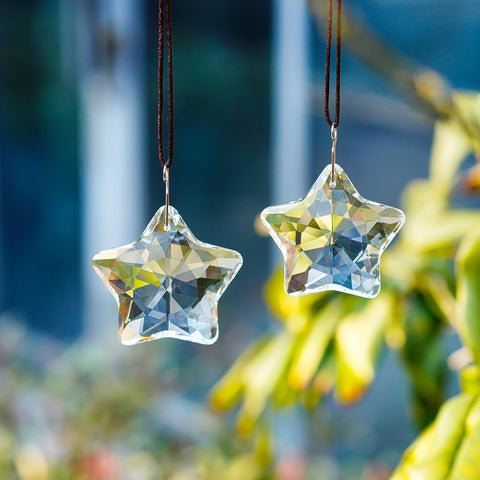 Two H&D HYALINE & DORA prisms with hooks and cords for easy hanging