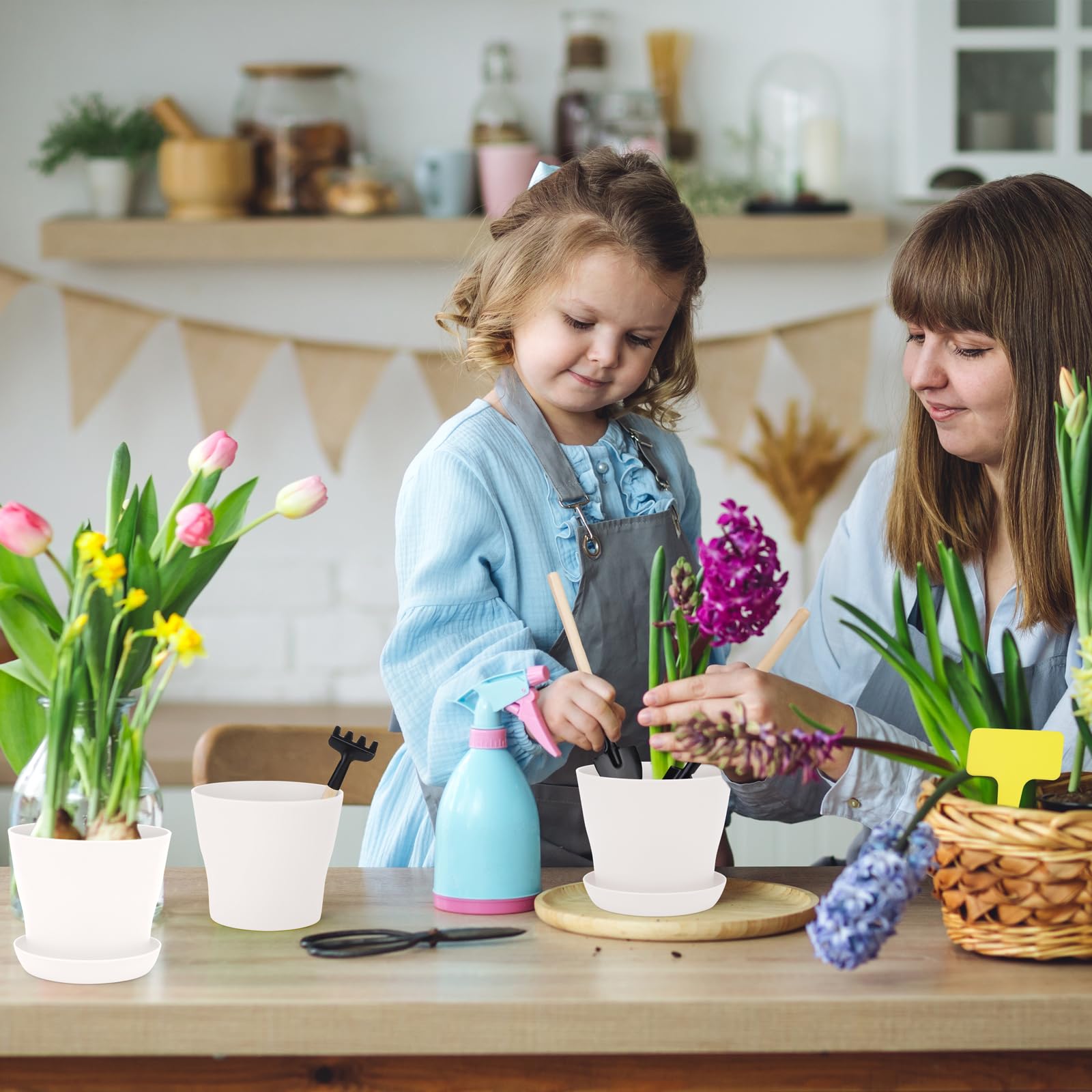 Hahood white nursery pots on a sunlit windowsill