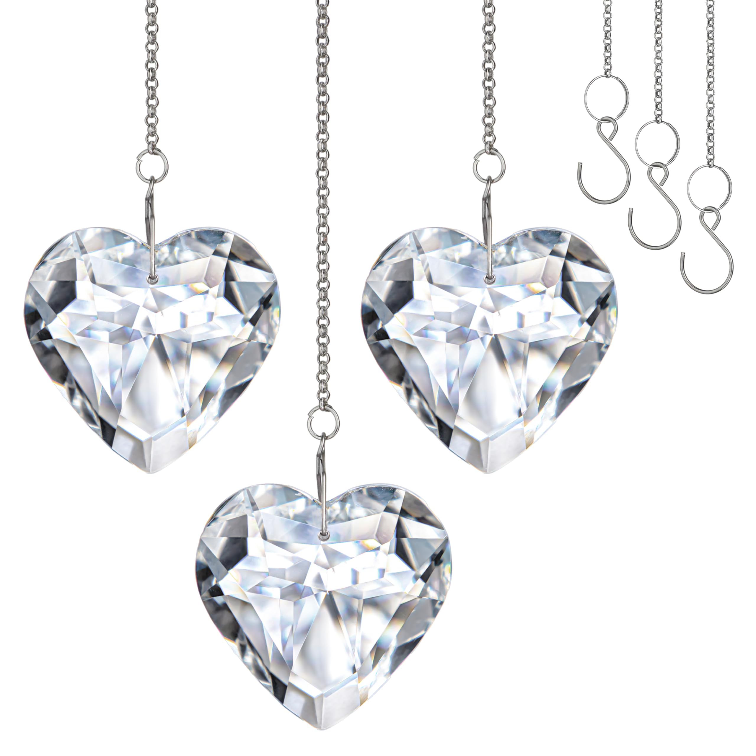H&D Hyaline & Dora clear crystal heart suncatchers casting vivid rainbows in sunny windows