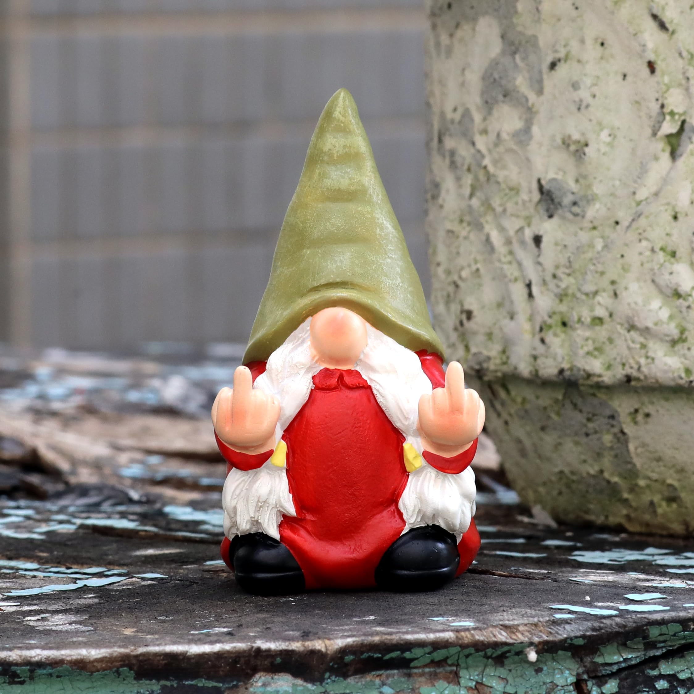 Hand-painted detail highlights personality in this charming gnome sculpture.