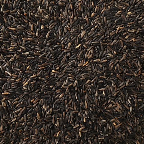 Happy Wings Nyjer seeds in a neat display emphasizing quality and freshness.