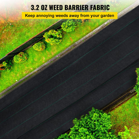 Happybuy heavy-duty 3.2 oz barrier laid out on a driveway for weed suppression.