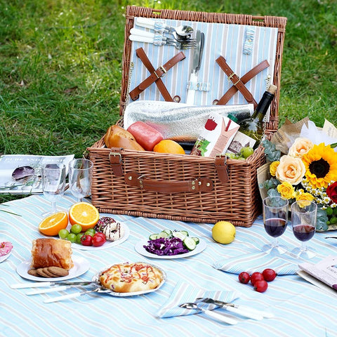 HappyPicnic waterproof blanket provides dry seating on damp grass or sand.
