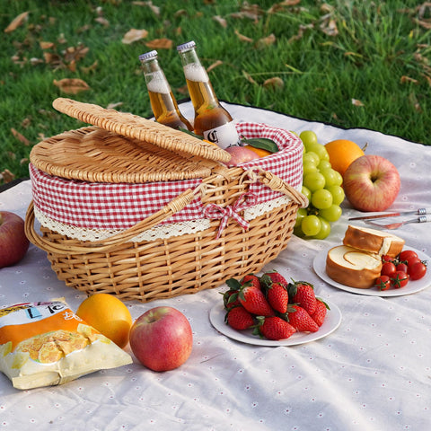 HappyPicnic multipurpose wicker basket holds snacks, flowers, or kitchen items.