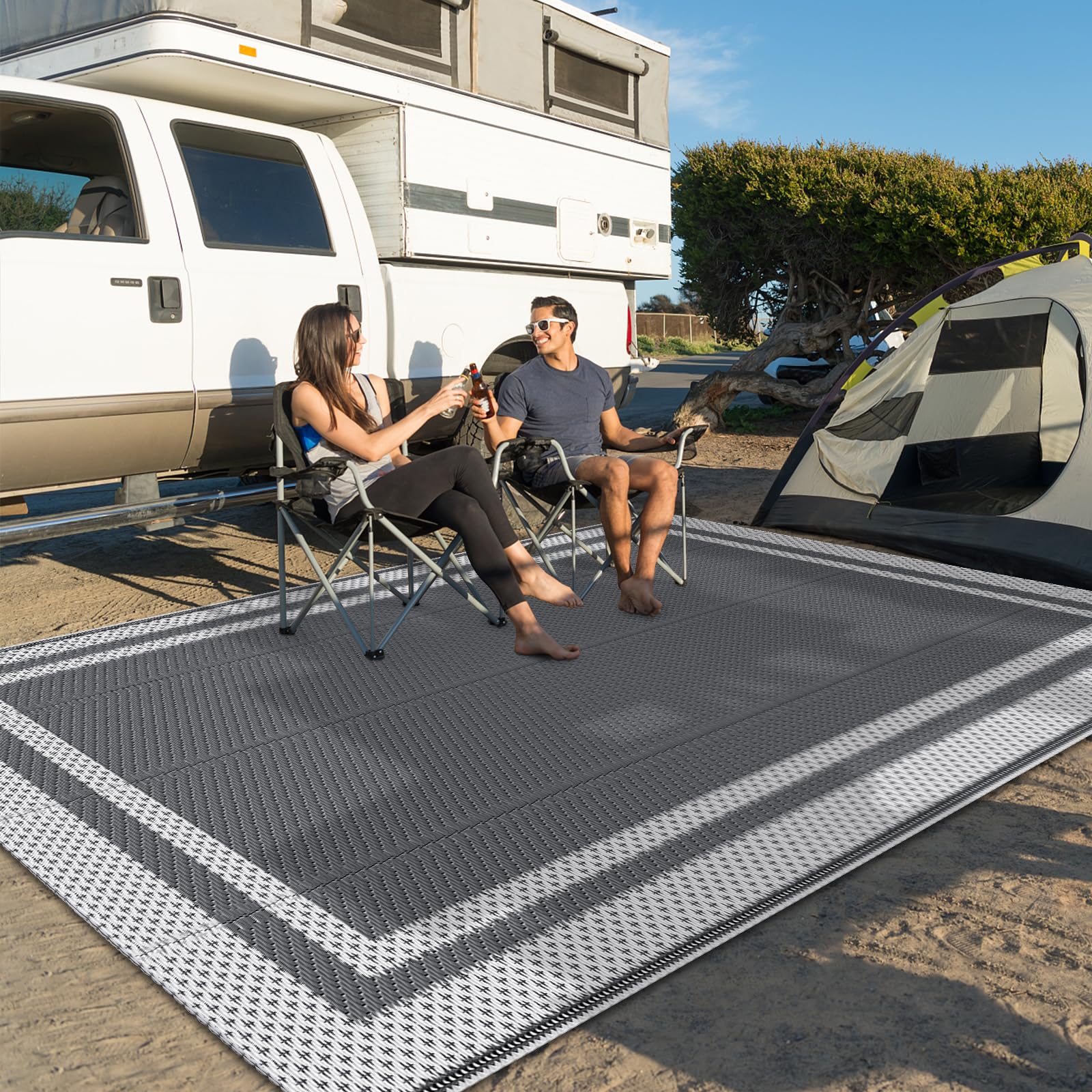 HappyTrends 5x8 rug on balcony under outdoor furniture.