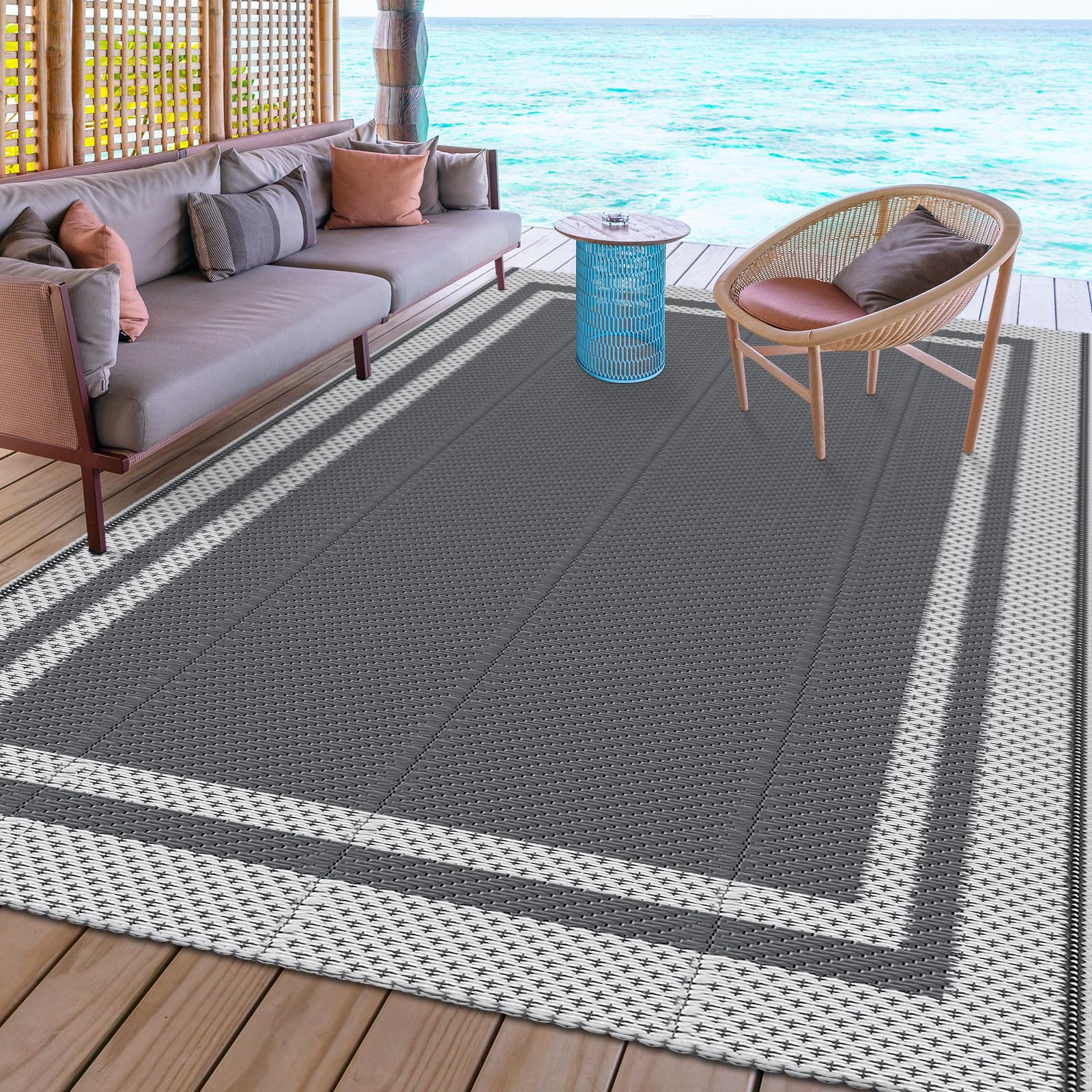 HappyTrends waterproof rug resists rain and splashes near RV.