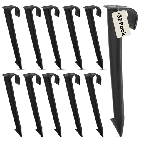 Harrier Hardware half-inch tubing anchor stake secures irrigation line in soil for stable watering.