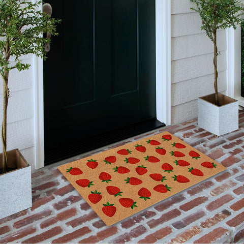 Haukea strawberry door mat on stairs or patio demonstrates versatile indoor-outdoor use