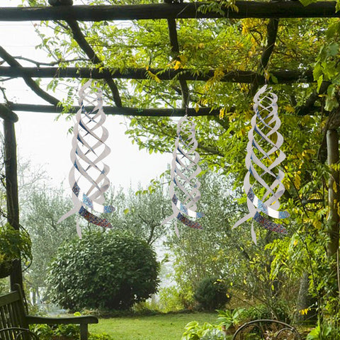 Hausse Bird Deterrent Spinner installed on a farm for orchards and gardens
