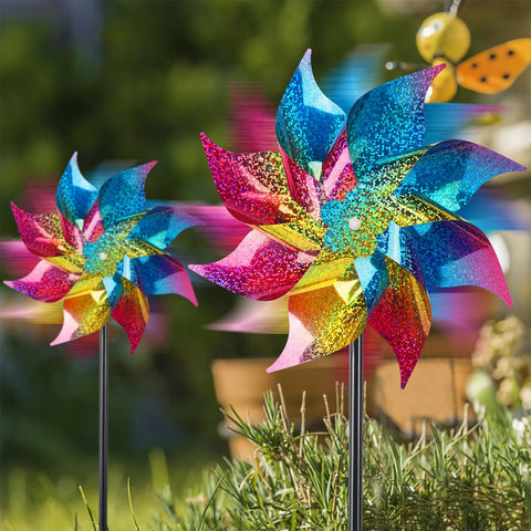 Hausse colorful pinwheels brighten orchards and barns while deterring birds.