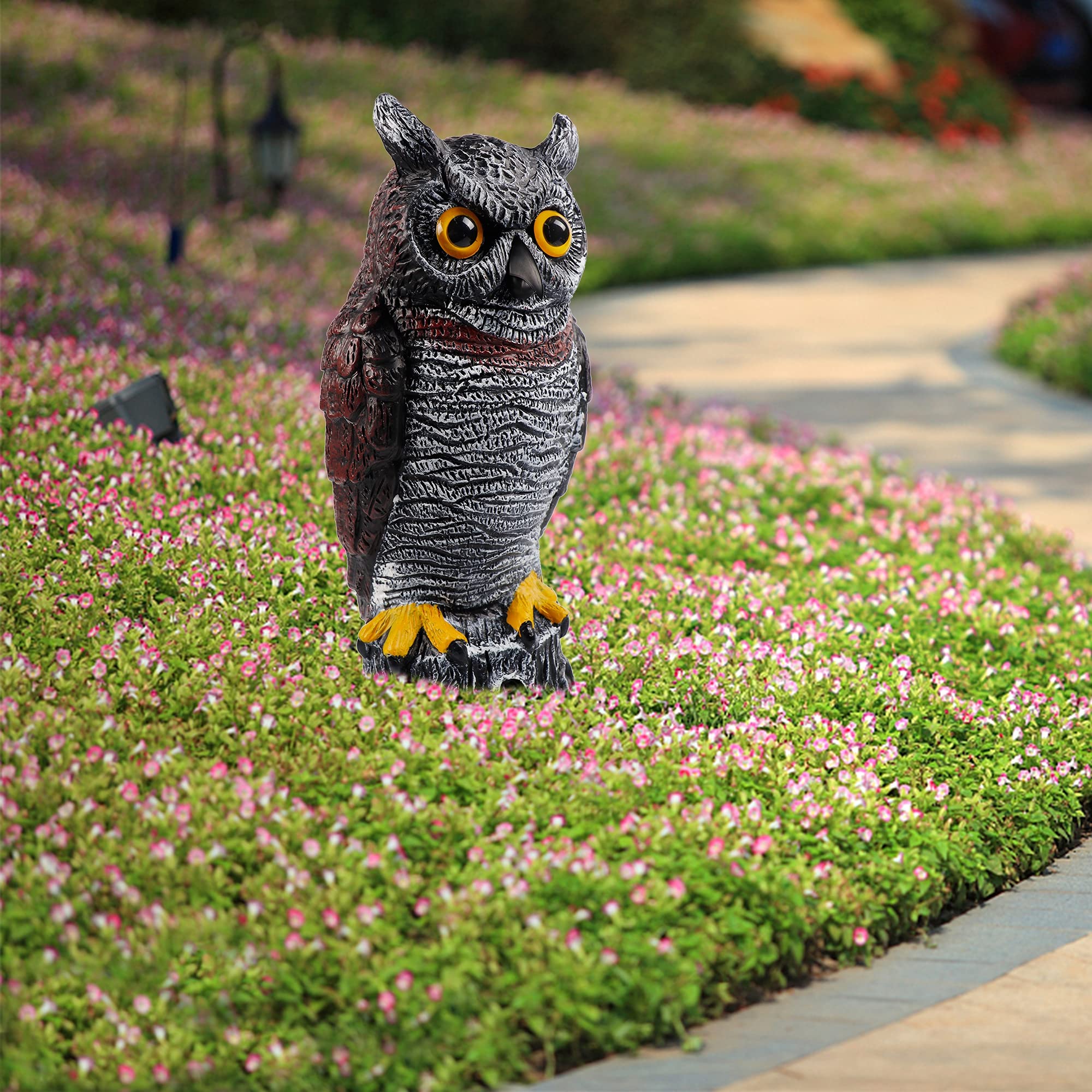 Hausse horned owl decoy mounted on a stick for easy placement.