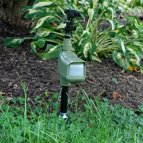 HAVAHART Critter Ridder in-use view shows active deterrence and spray