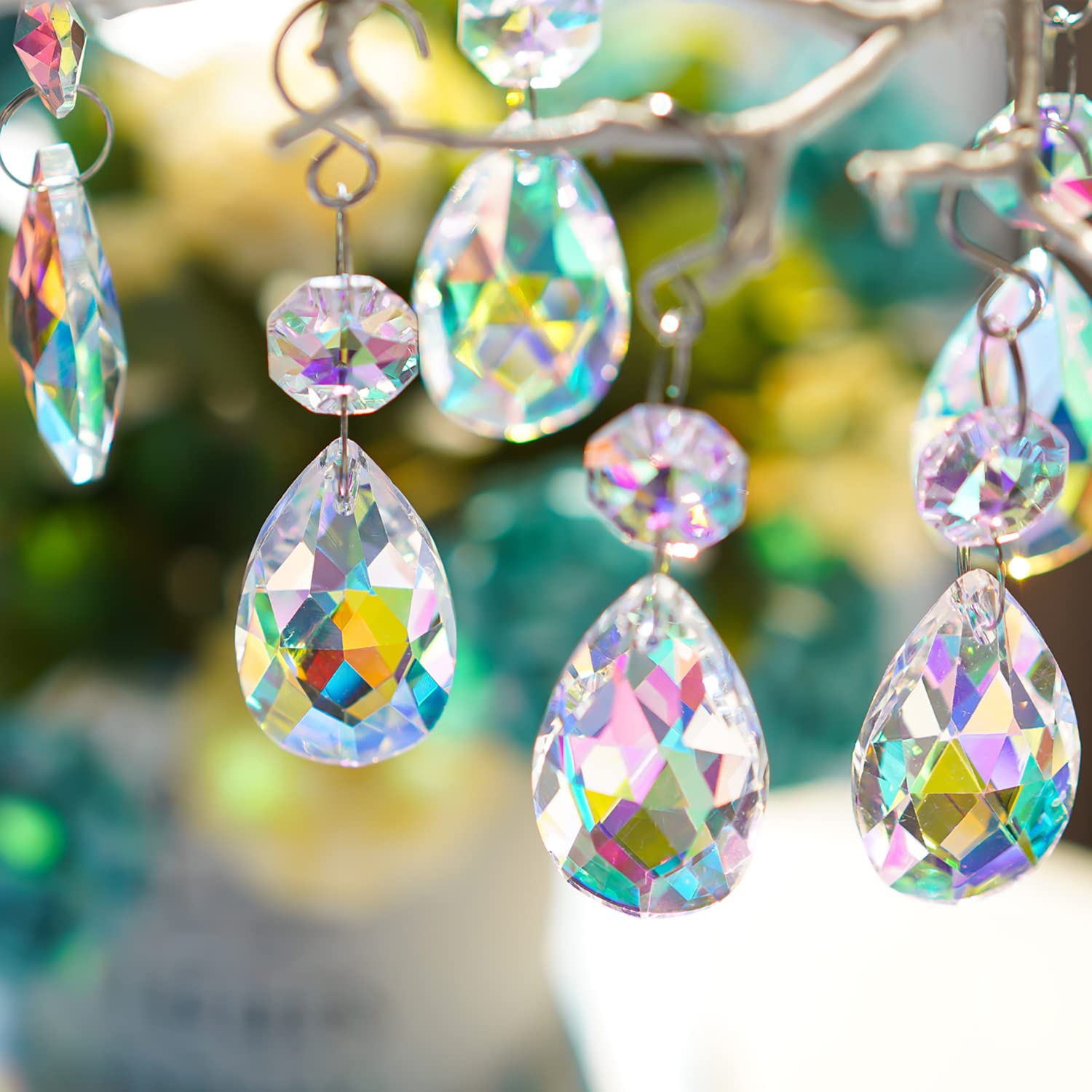 H&D HYALINE & DORA AB-color prisms create shifting rainbows in daylight.