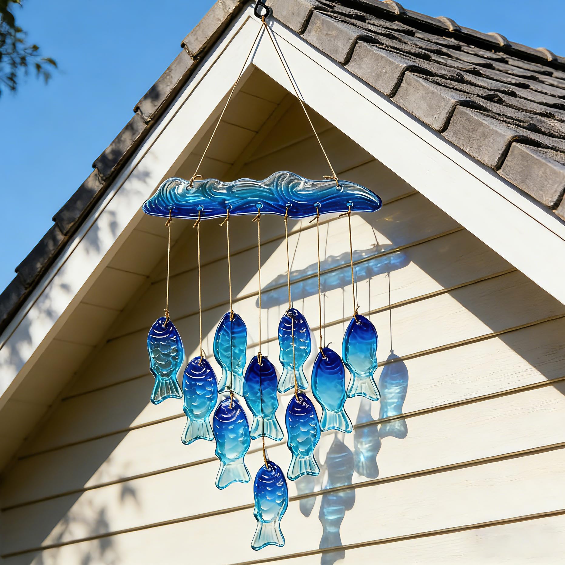 H&D Hyaline & Dora blown glass fish wind chime adds ocean charm to garden or porch.