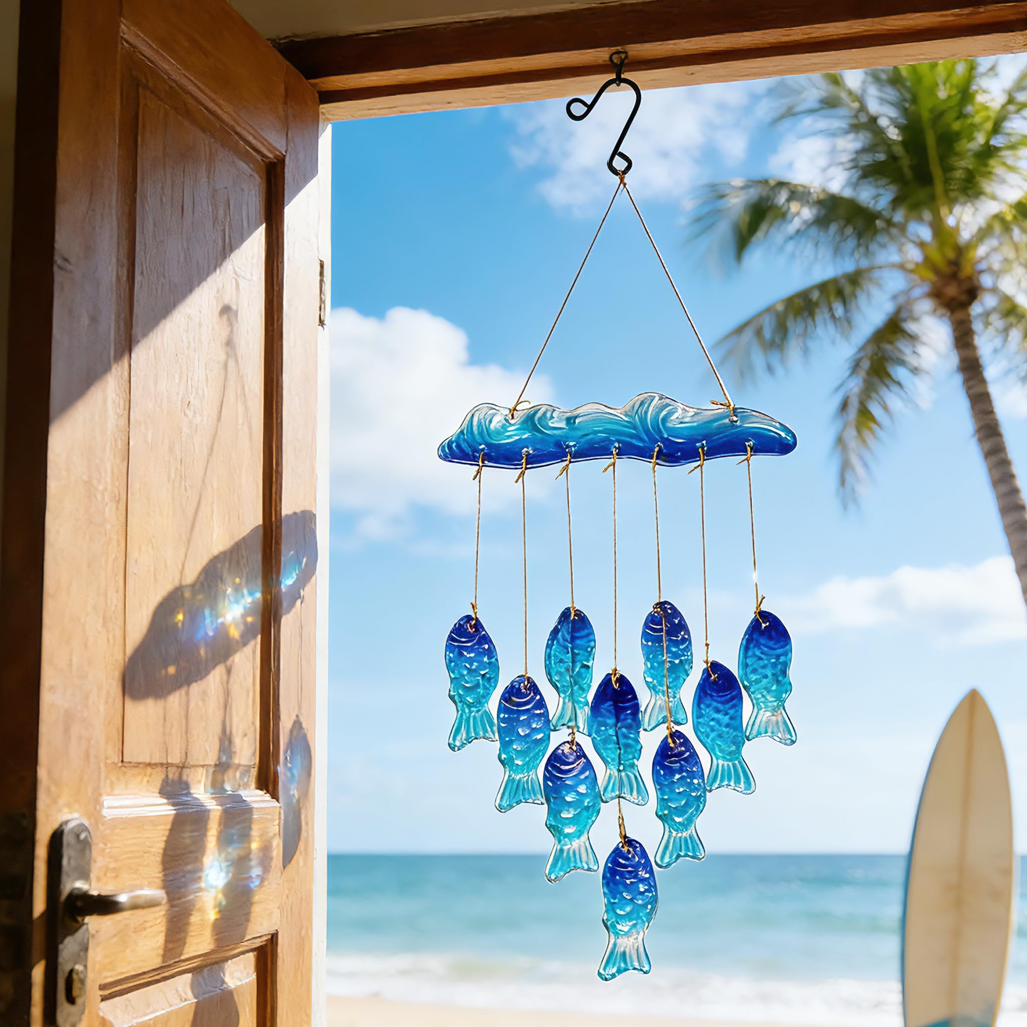 H&D Hyaline & Dora blue sea glass wind chime shimmering in sunlight for outdoor decor.