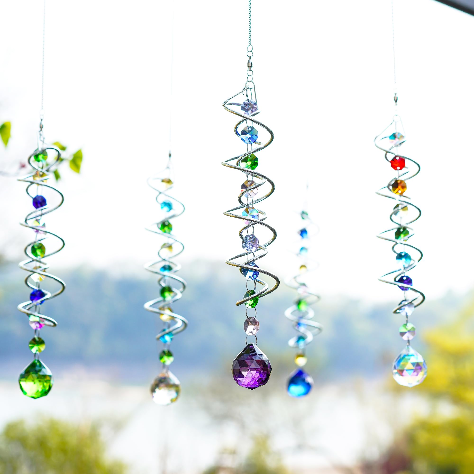 H&D Hyaline & Dora gazing ball sun catcher brightens indoor windows.